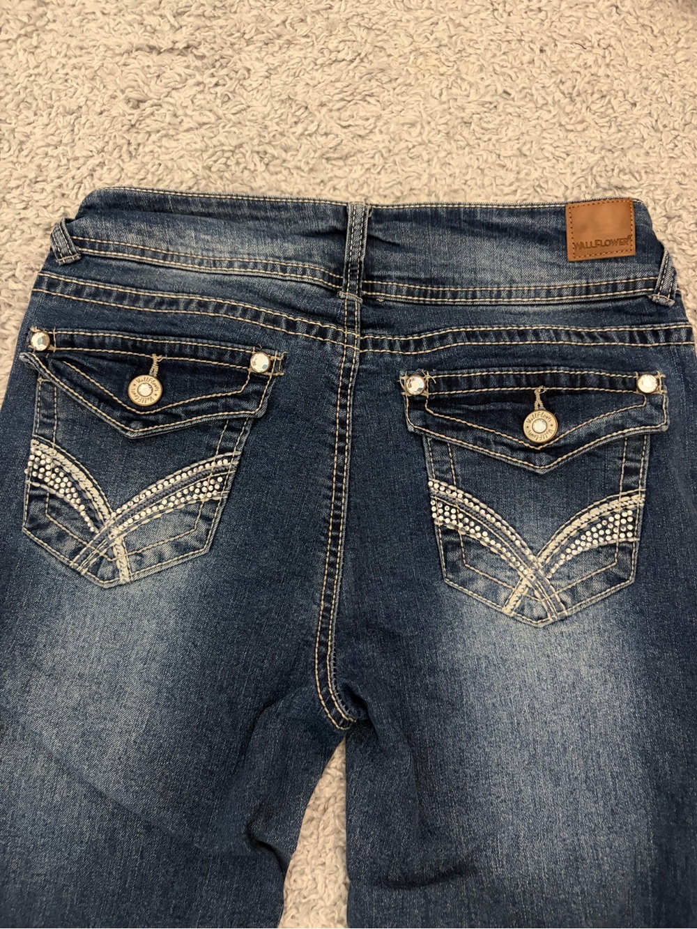 Vintage looking Wallflower low rise bootcut jeans with rhinestone details